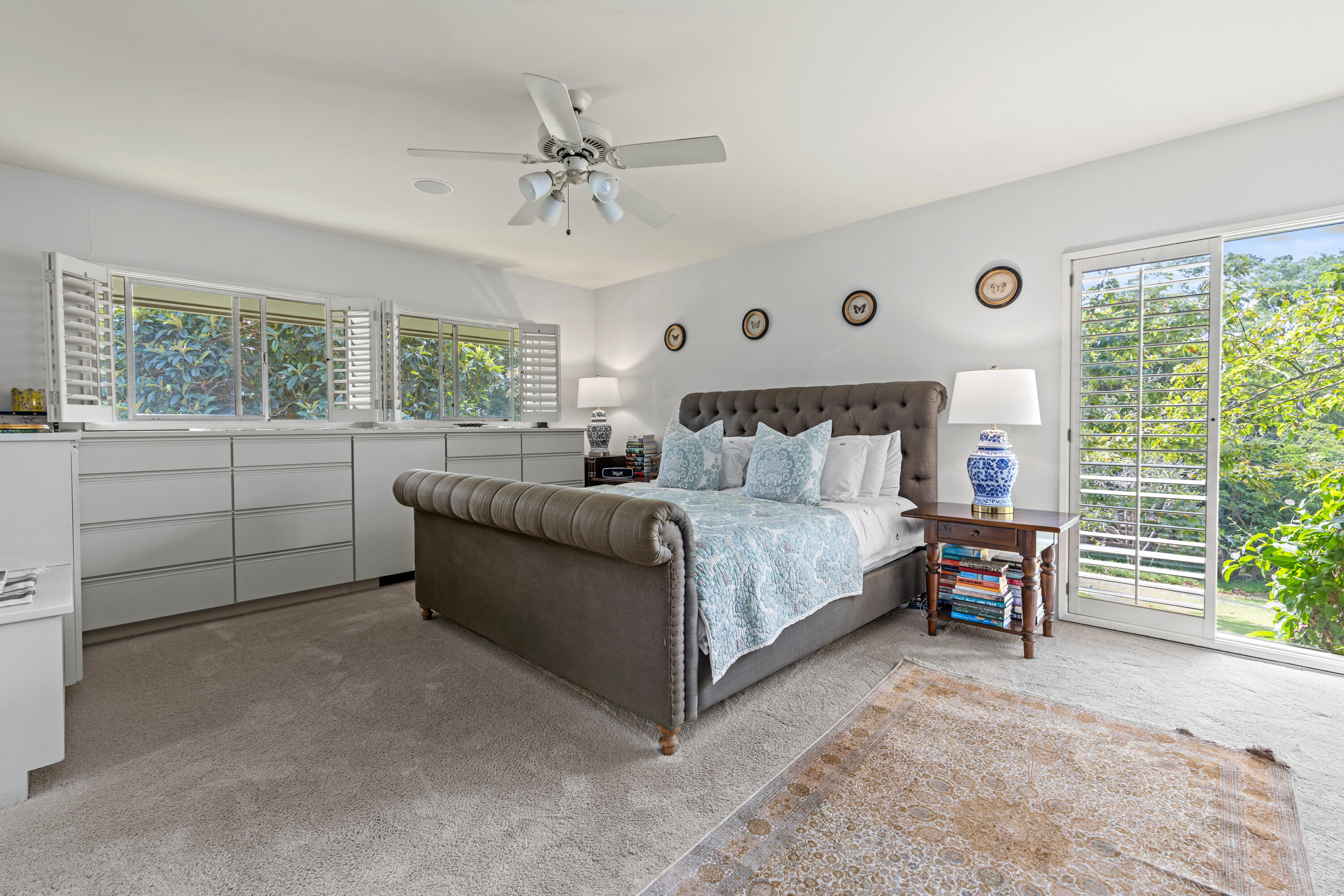 785 Carosam Road Santa Barbara, CA 93110 - Photo 25 of 46 a bedroom with a bed and a large window