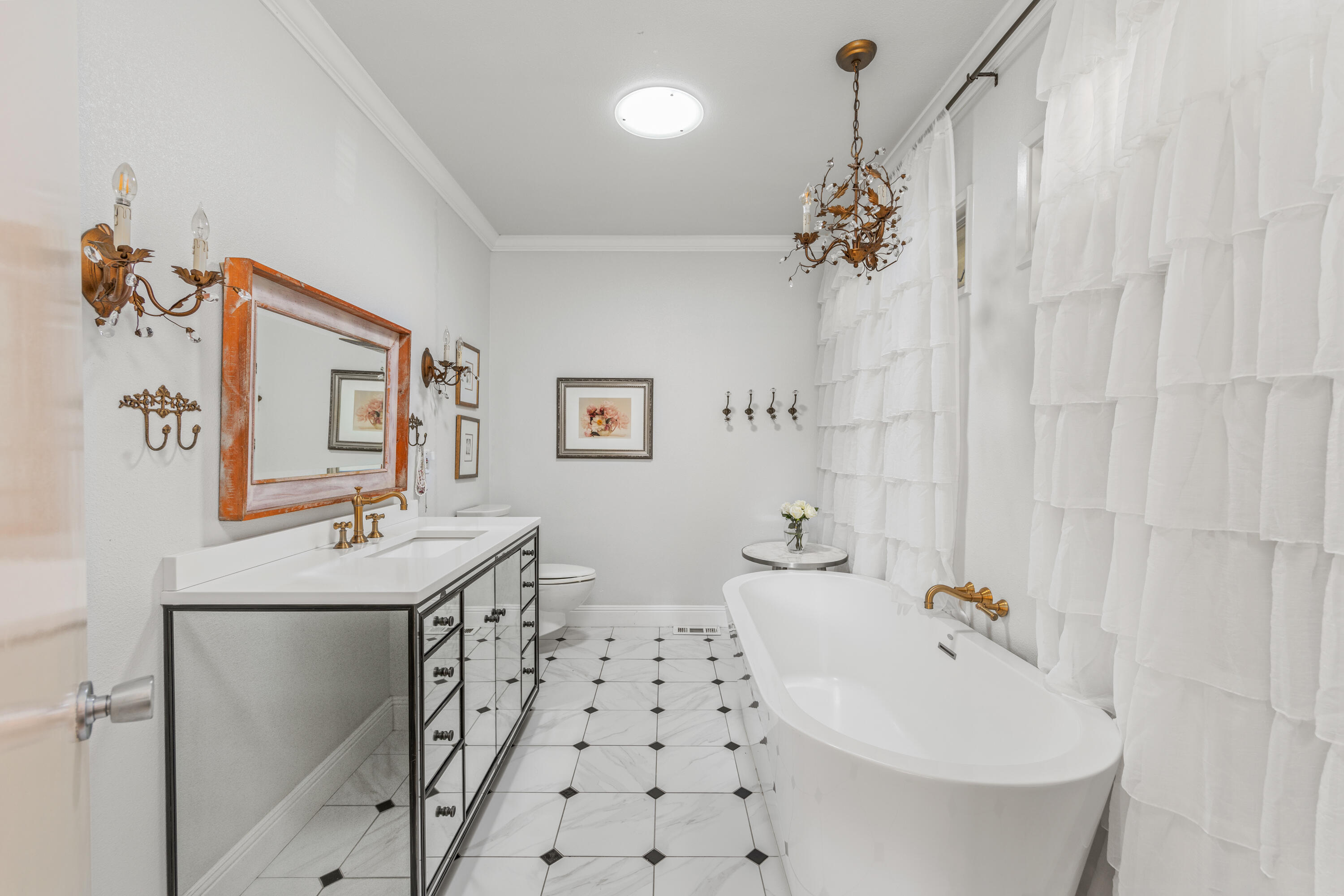 785 Carosam Road Santa Barbara, CA 93110 - Photo 27 of 46 a bathroom with a sink and a mirror