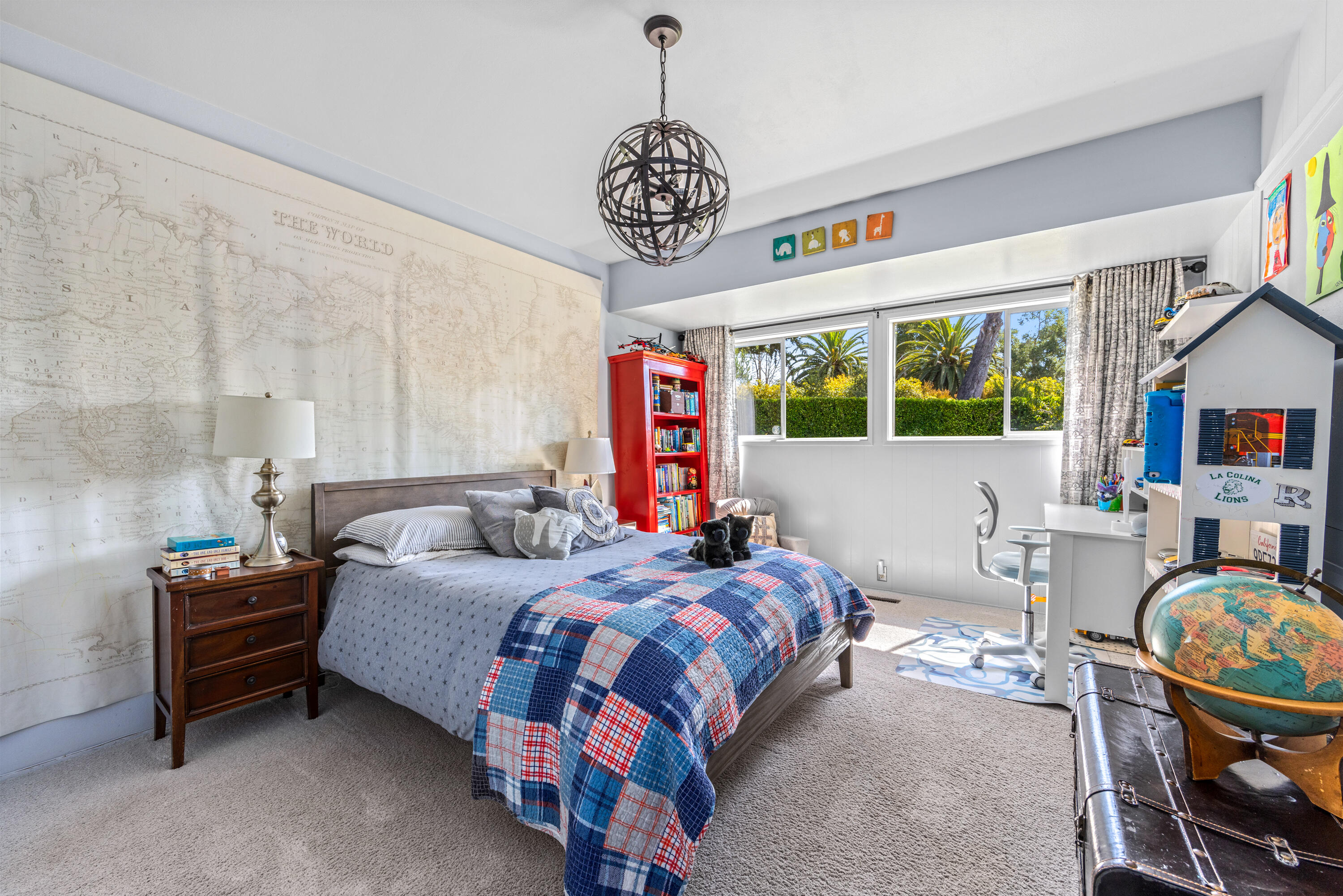 785 Carosam Road Santa Barbara, CA 93110 - Photo 28 of 46 a bedroom with bed a chandelier and a window