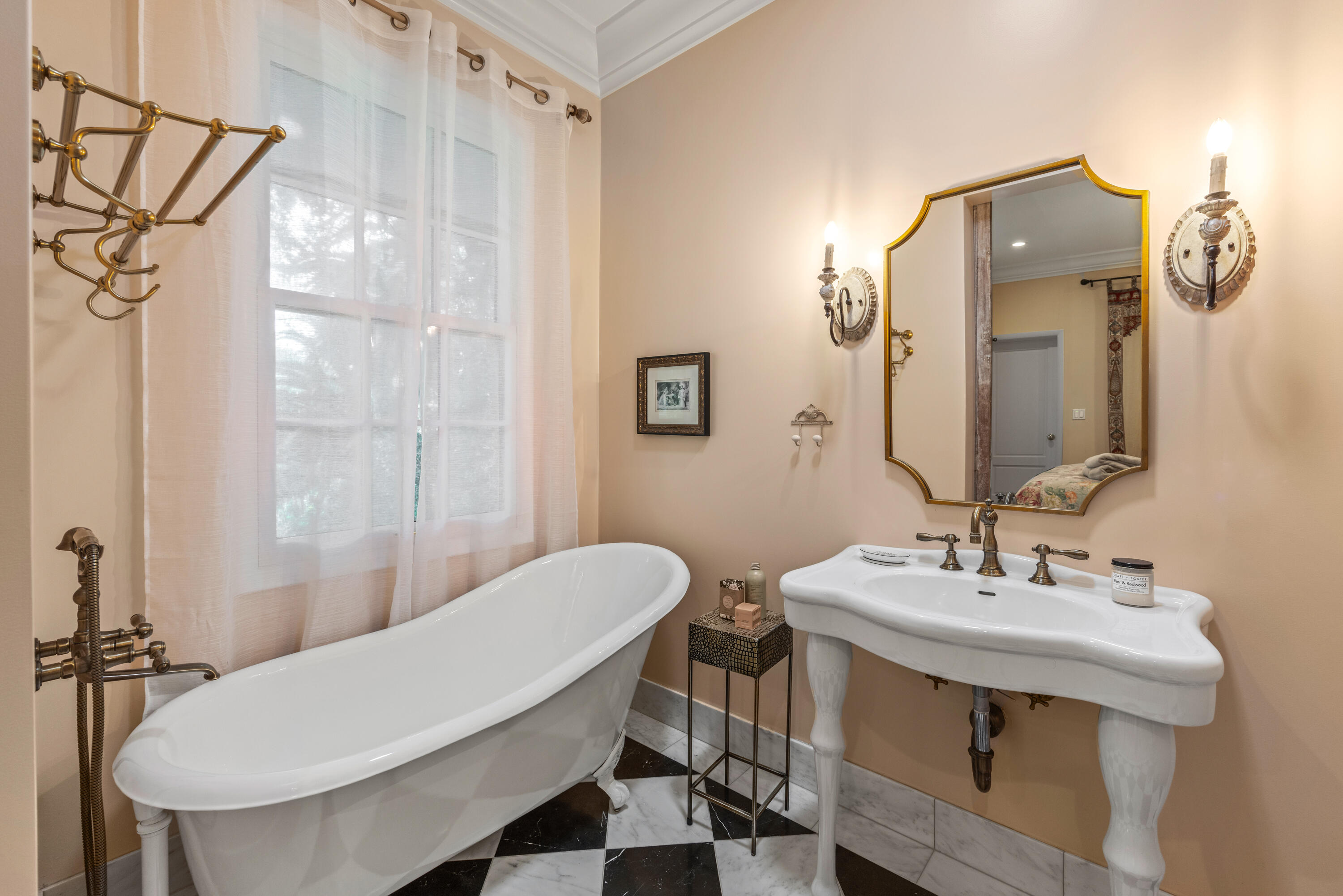 785 Carosam Road Santa Barbara, CA 93110 - Photo 33 of 46 a bathroom with a sink mirror and a toilet