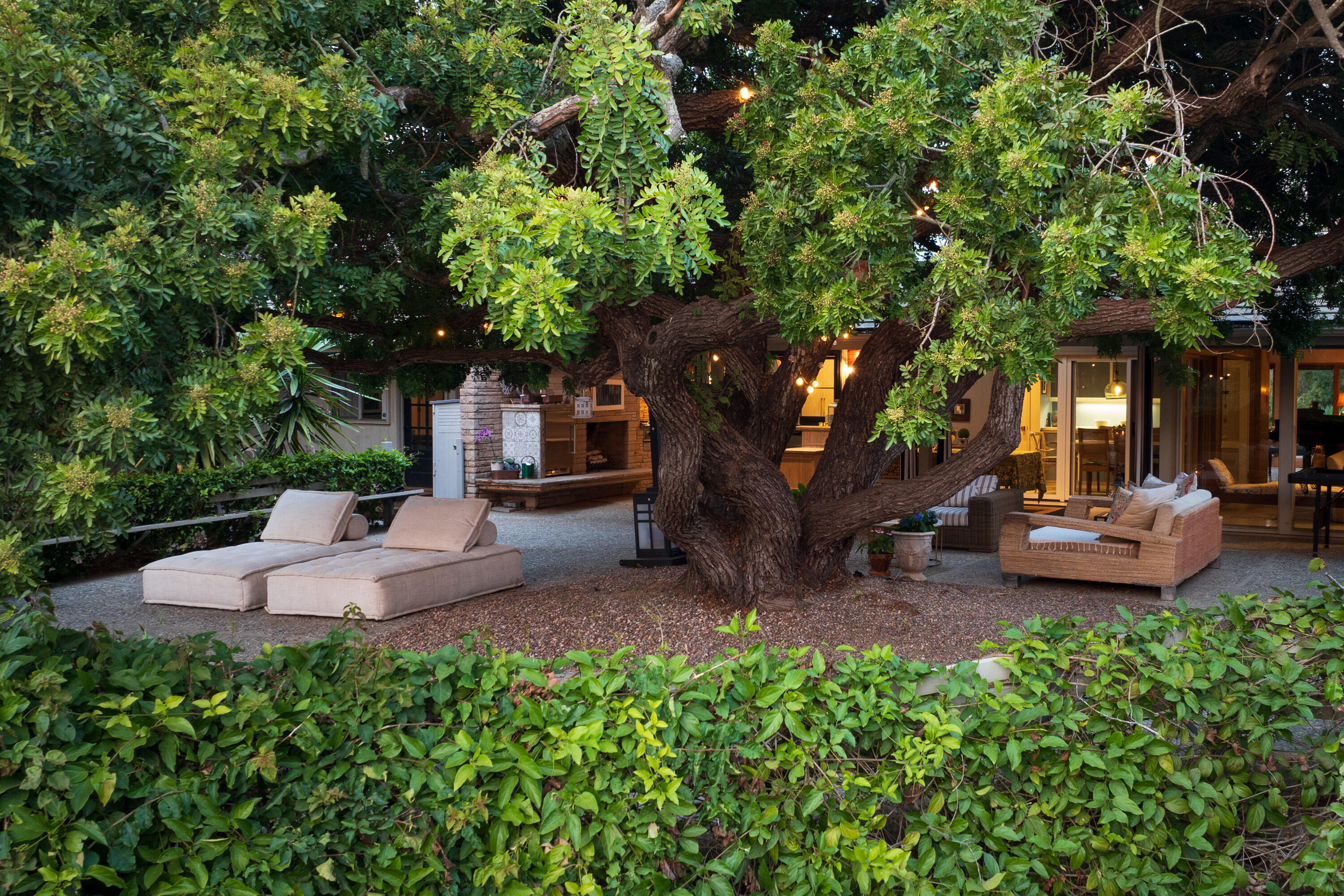 785 Carosam Road Santa Barbara, CA 93110 - Photo 40 of 46 a view of a chair and table in backyard of the house
