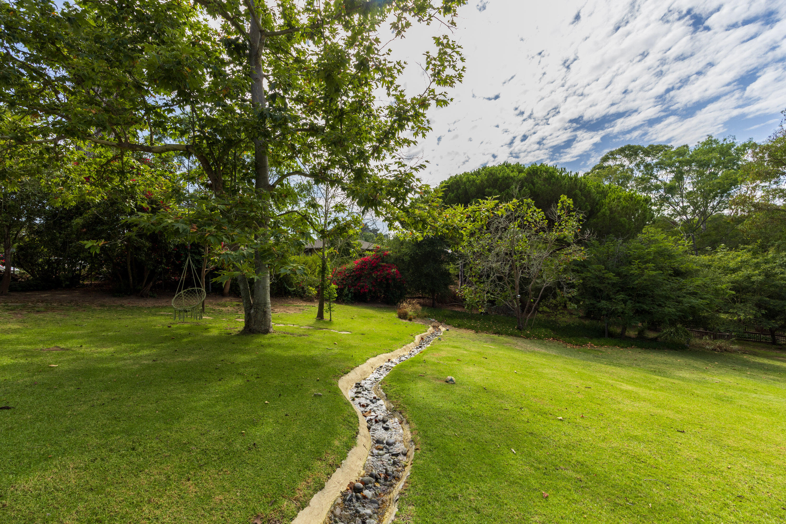 785 Carosam Road Santa Barbara, CA 93110 - Photo 43 of 46 a backyard of a house with lots of green space