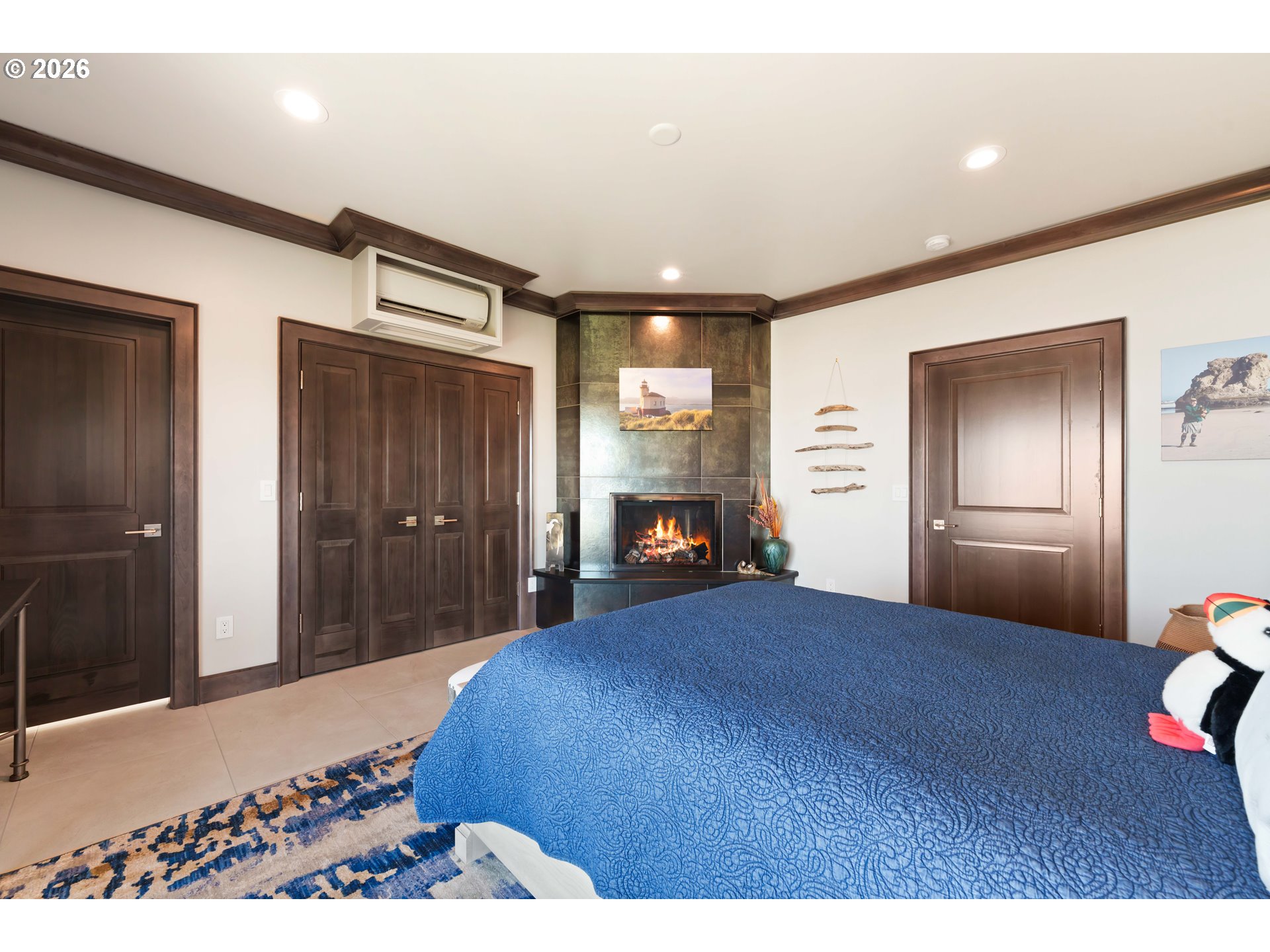 2488 Beach Loop Road Bandon, OR 97411 - Photo 43 of 48 a bedroom with a bed and a television