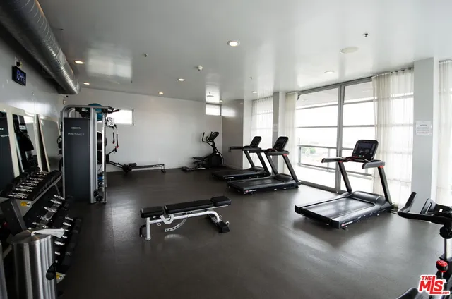 a view of a room with gym equipment