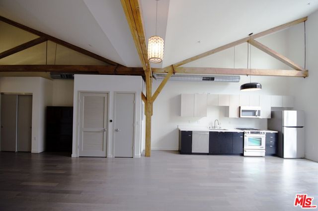 a view of kitchen and front door