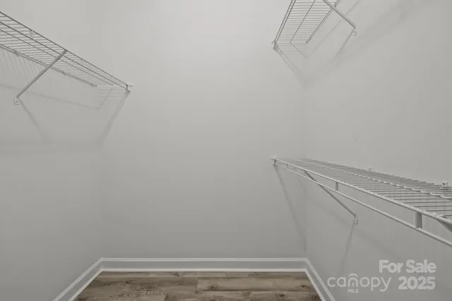 a view of a room with racks on the wall