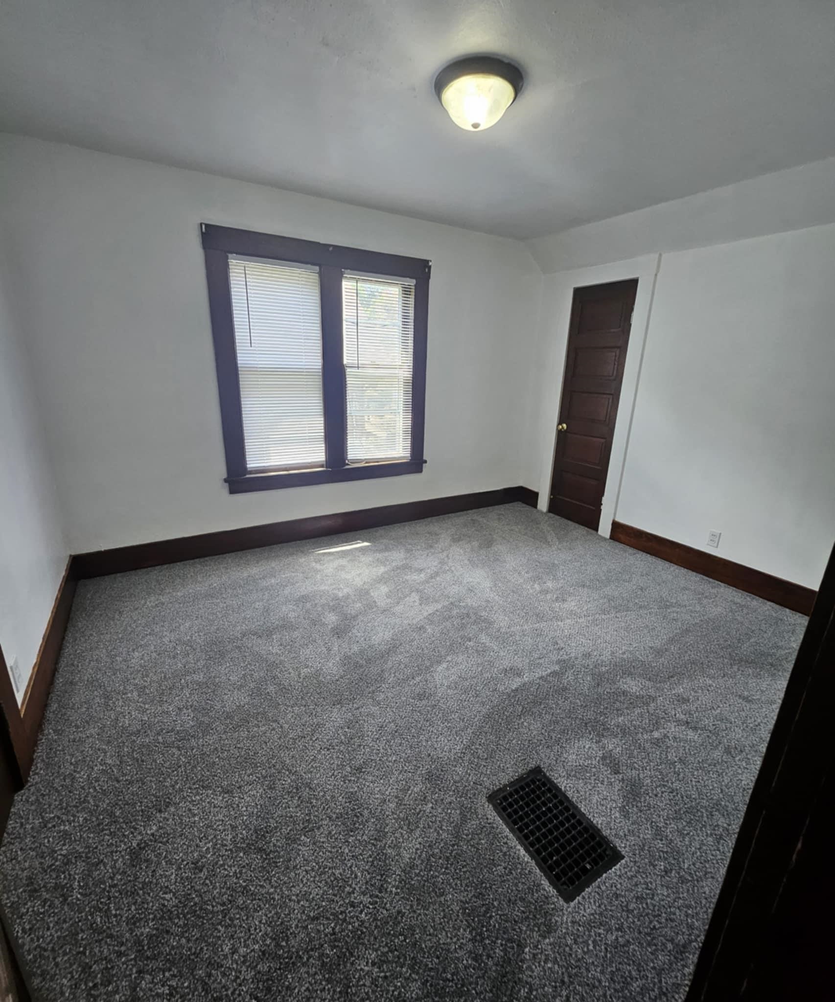 1219 Hackett Street Beloit, WI 53511 - Photo 12 of 19 an empty room with windows