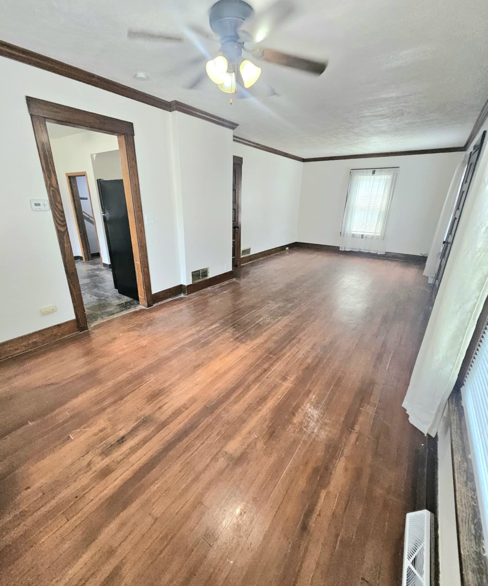 1219 Hackett Street Beloit, WI 53511 - Photo 4 of 19 a view of empty room with wooden floor