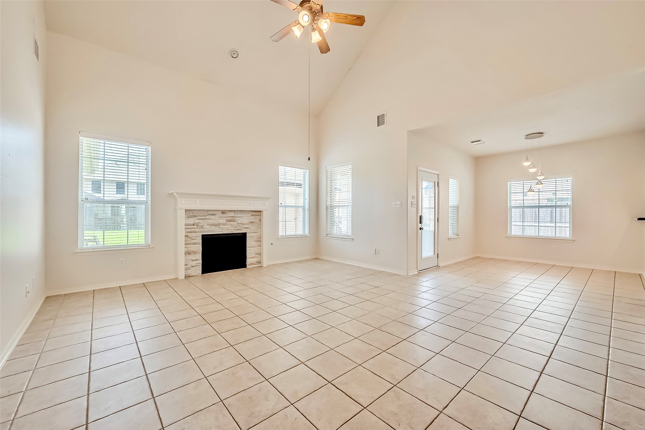 5506 Flower Grove Court Rosharon, TX 77583 - Photo 2 of 30 Living room with cozy chimney