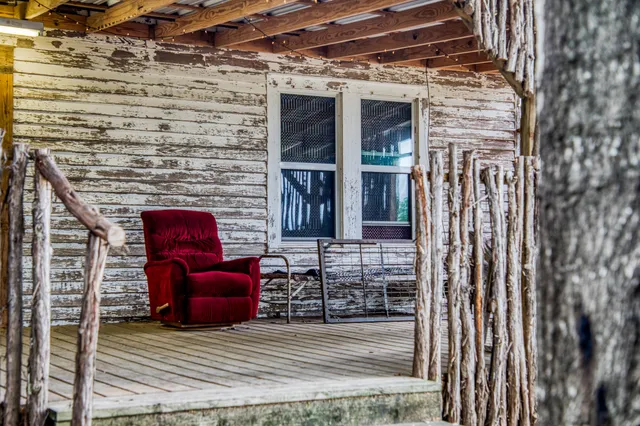a view of front door with outdoor seating
