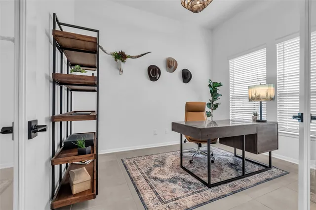 a view of a workspace with furniture