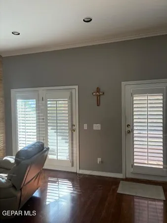 a view of a livingroom with furniture and a window