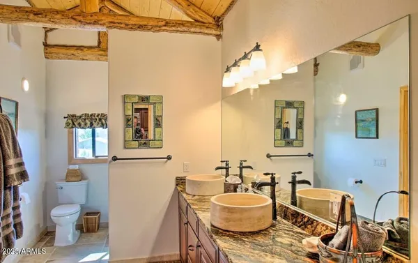 a utility room with sink dryer and washer