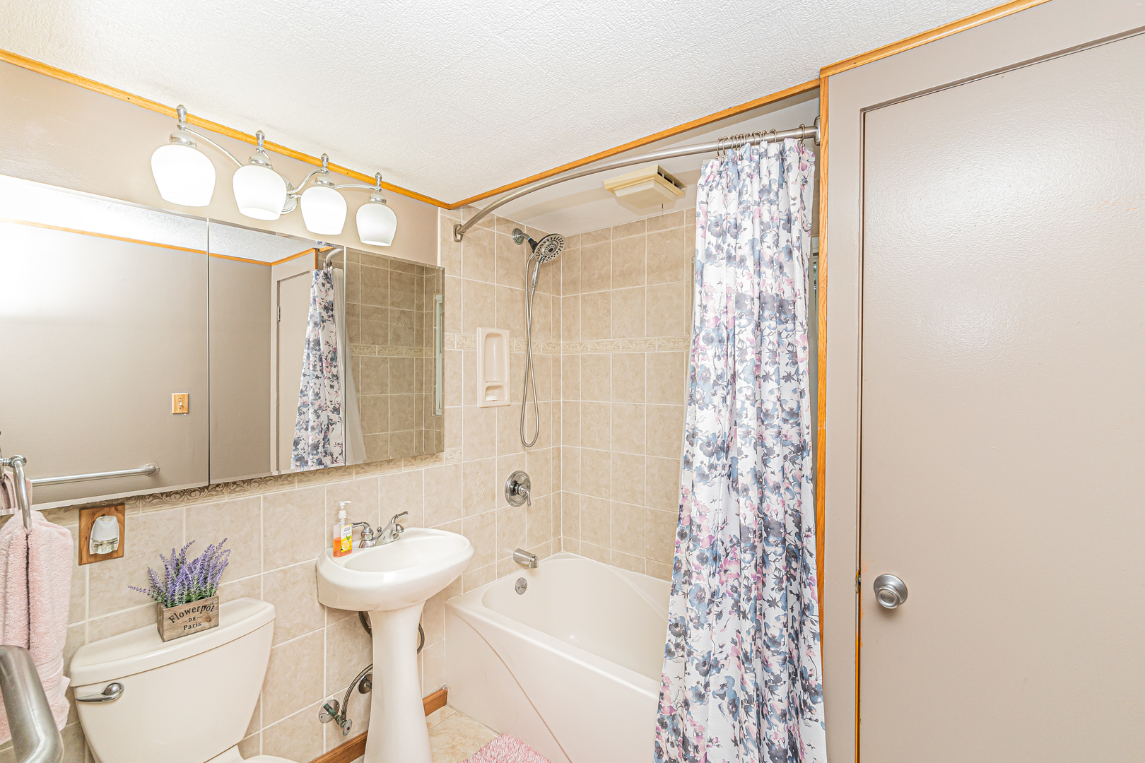 19264 Airport Road Romeoville, IL 60446 - Photo 12 of 27 a bathroom with a sink and a shower