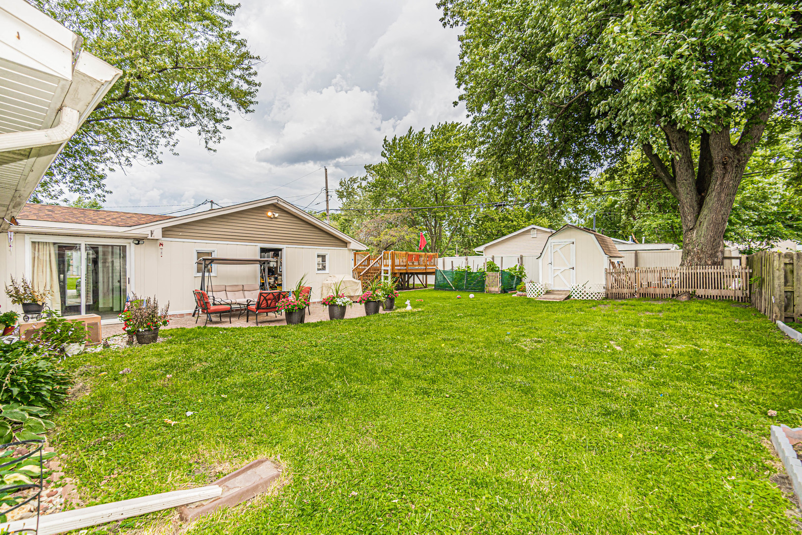 19264 Airport Road Romeoville, IL 60446 - Photo 18 of 27 a view of a house with backyard and garden