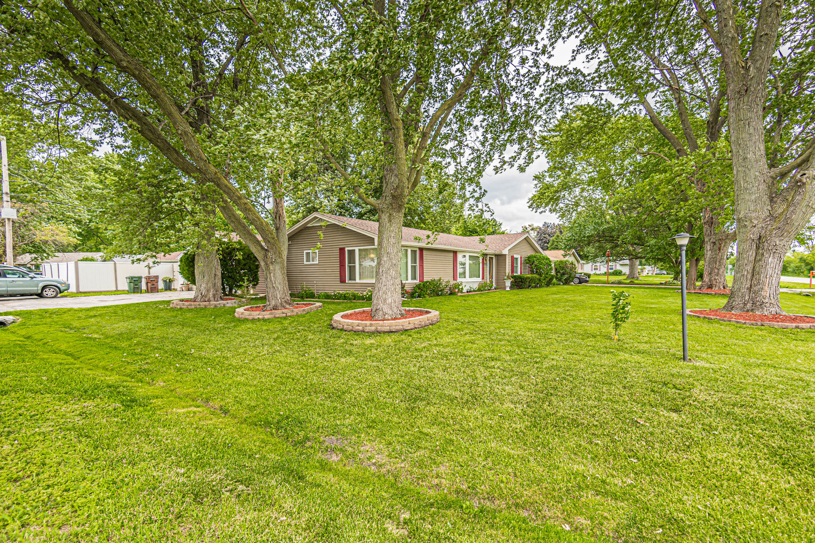 19264 Airport Road Romeoville, IL 60446 - Photo 27 of 27 a view of an house with backyard space and garden