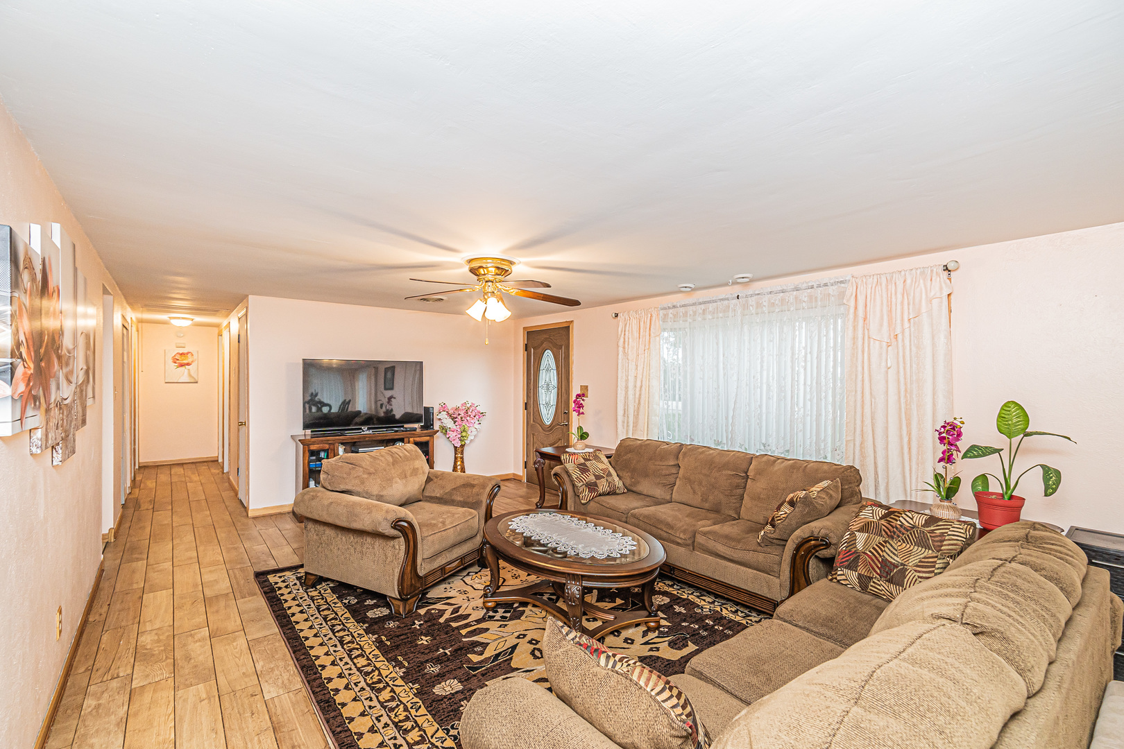 19264 Airport Road Romeoville, IL 60446 - Photo 4 of 27 a living room with furniture and a rug