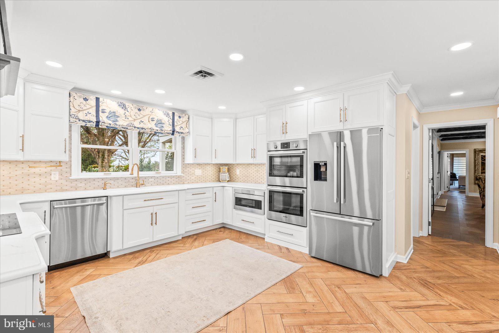 6759 Moulstown Road Hanover, PA 17331 - Photo 42 of 111 a kitchen with granite countertop a refrigerator and a stove top oven
