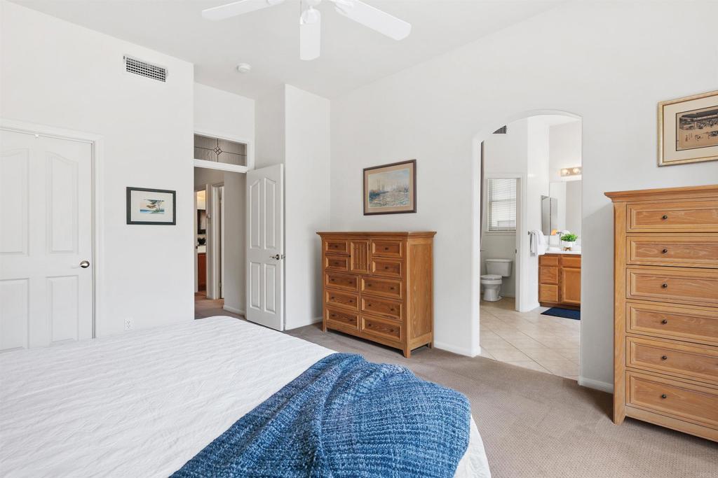 2330 Longfellow Road Carlsbad, CA 92008 - Photo 19 of 30 a bedroom with a bed and closet