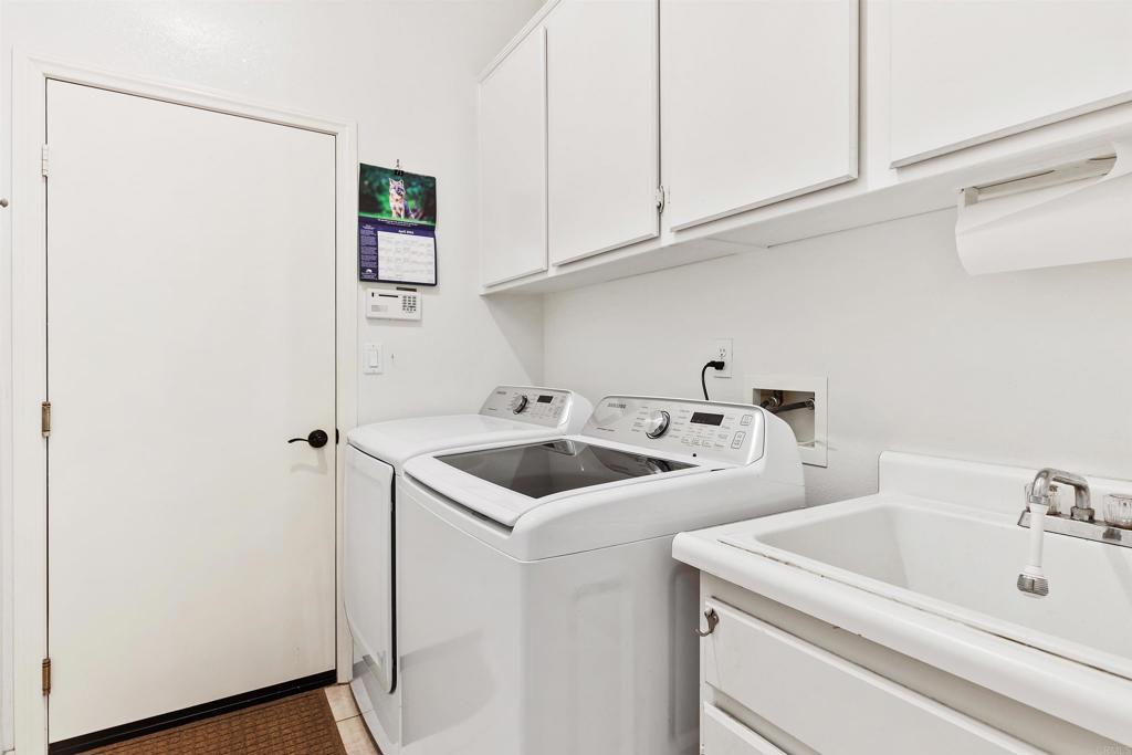 2330 Longfellow Road Carlsbad, CA 92008 - Photo 26 of 30 a utility room with sink dryer and washer