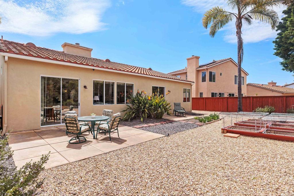 2330 Longfellow Road Carlsbad, CA 92008 - Photo 28 of 30 a view of a house with backyard and sitting area