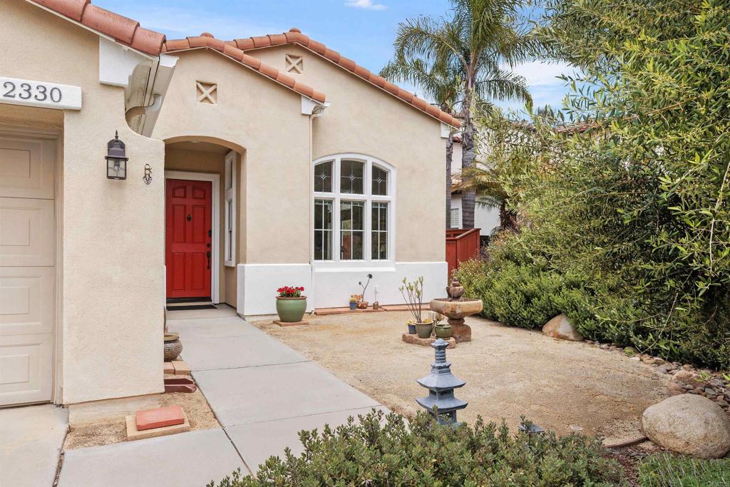 2330 Longfellow Road Carlsbad, CA 92008 - Photo 3 of 30 a front view of a house with a yard