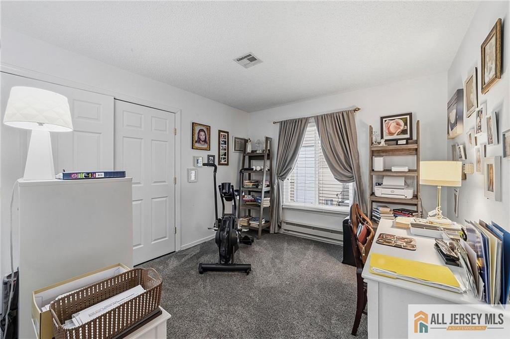 491A Delair Road, Unit 491B Monroe Township, NJ 08831 - Photo 12 of 22 a view of a room with gym equipment