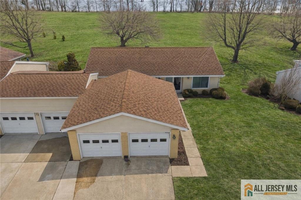 491A Delair Road, Unit 491B Monroe Township, NJ 08831 - Photo 21 of 22 a view of a back yard of the house