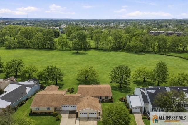 491A Delair Road, Unit 491B Monroe Township, NJ 08831 - Photo 22 of 22 an aerial view of a house with a yard and lake view