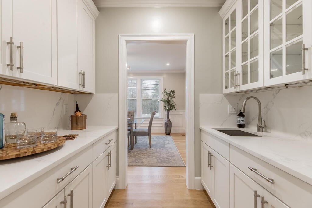 1019 Central Avenue Needham, MA 02492 - Photo 11 of 28 a kitchen with sink and cabinets