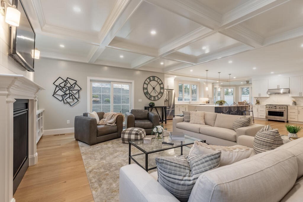 1019 Central Avenue Needham, MA 02492 - Photo 18 of 28 a living room with furniture white walls and stainless steel appliances