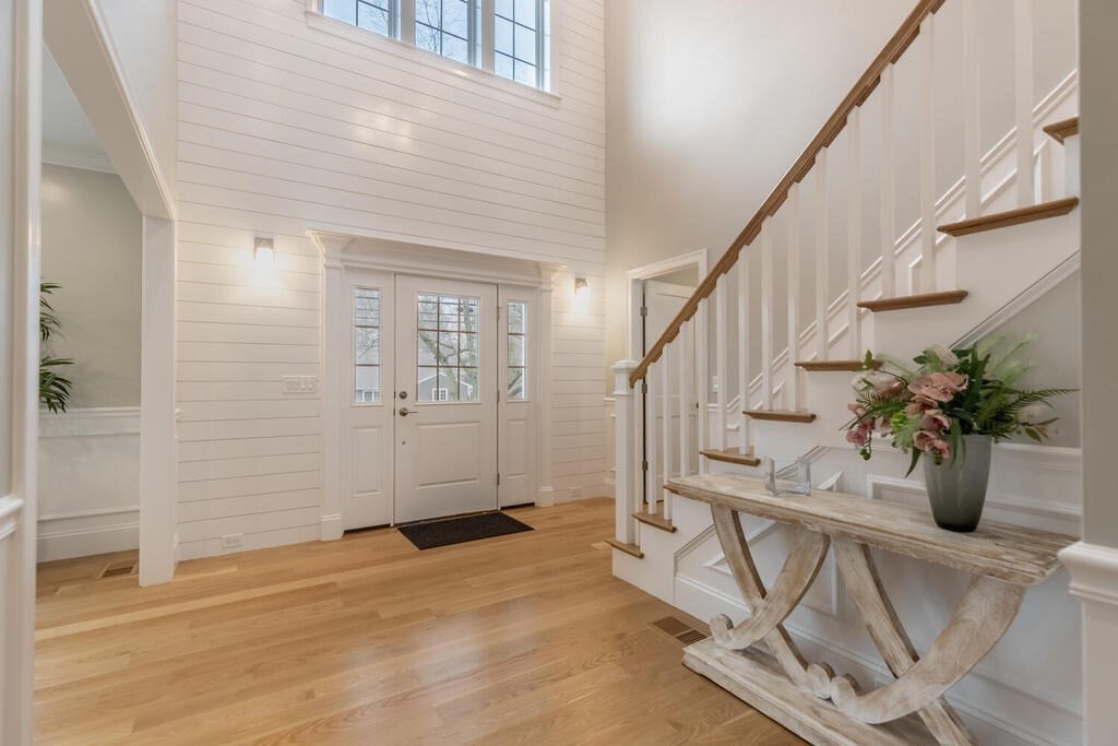 1019 Central Avenue Needham, MA 02492 - Photo 7 of 28 a view of entryway and hall