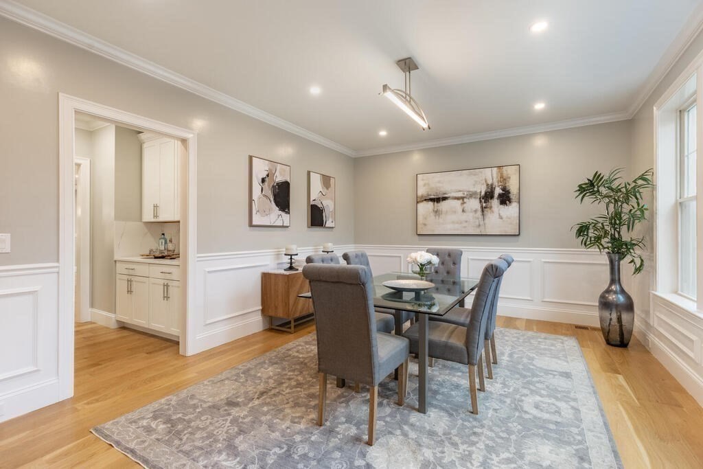 1019 Central Avenue Needham, MA 02492 - Photo 9 of 28 a view of a dining room with furniture