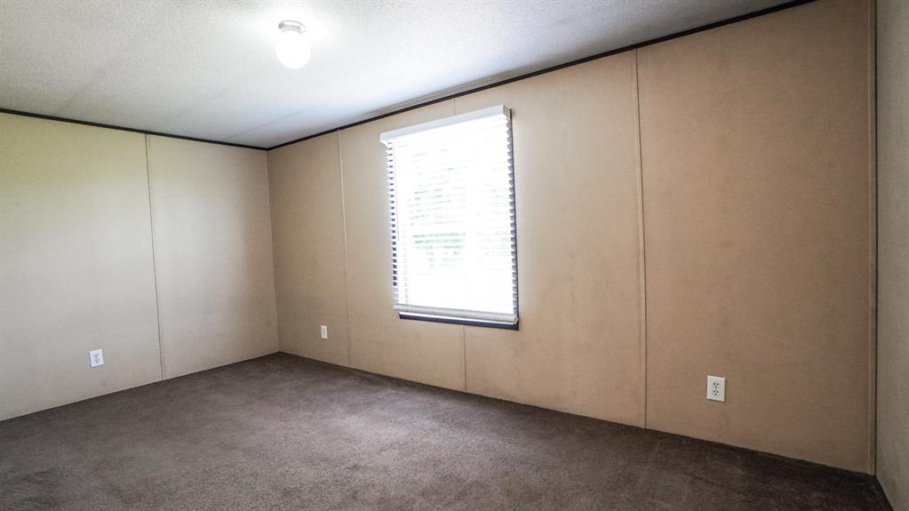 1104 North King Road Fate, TX 75189 - Photo 11 of 15 an empty room with a window