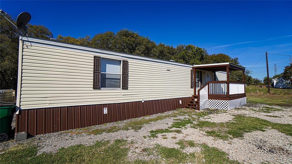 1104 North King Road Fate, TX 75189 - Photo 3 of 15 a front view of a house with a yard