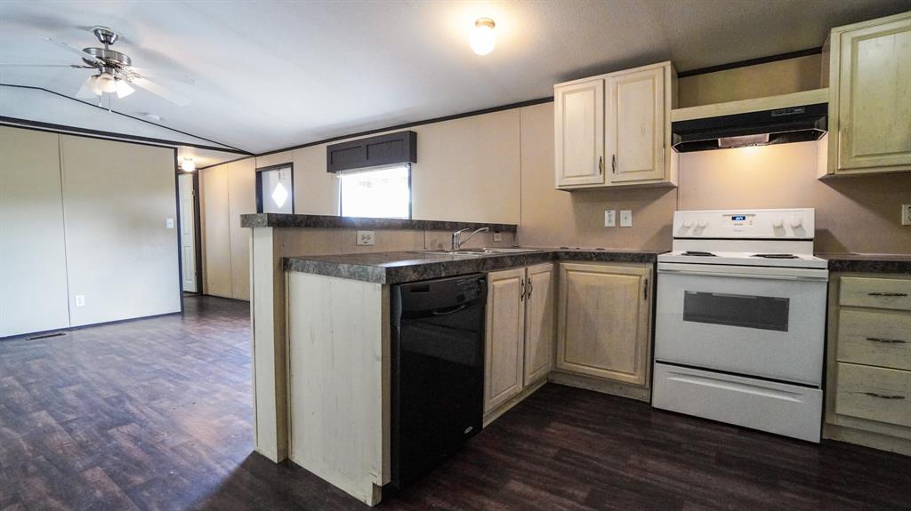 1104 North King Road Fate, TX 75189 - Photo 6 of 15 a kitchen with a stove oven and sink