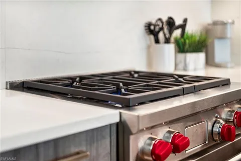 a close up of a stove top oven sitting inside of a kitchen