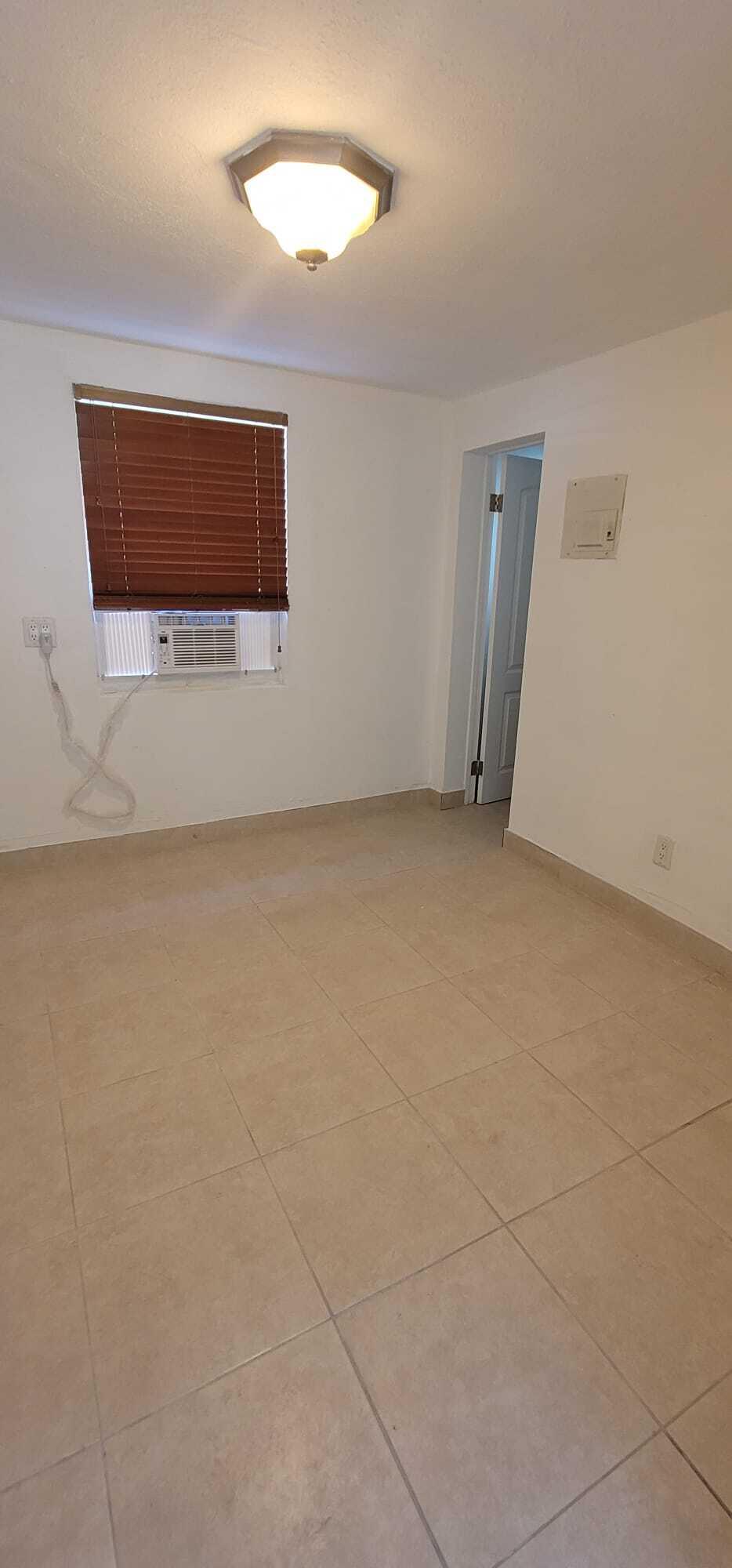 5721 Fillmore Street Hollywood, FL 33021 - Photo 6 of 17 a view of an empty room