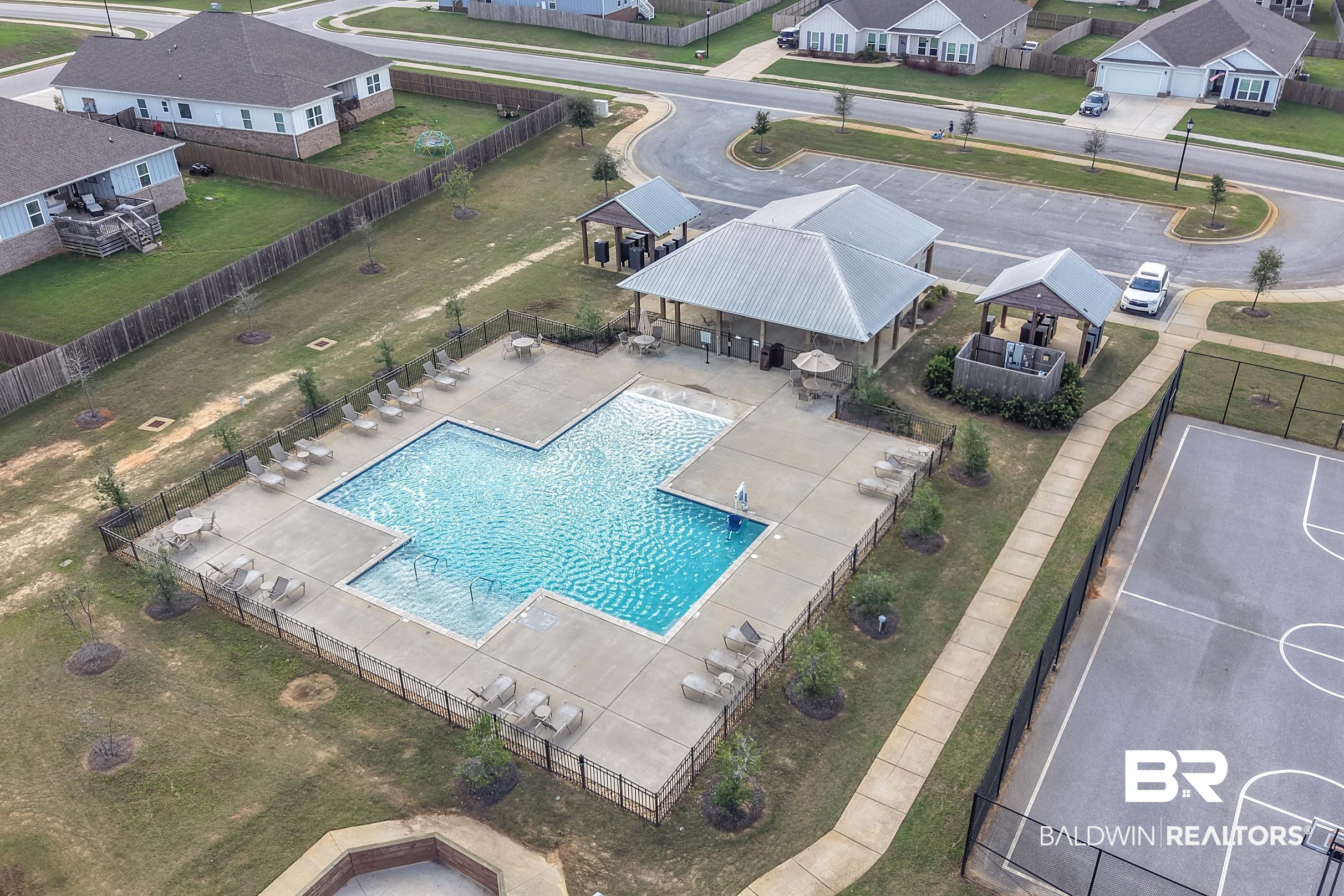 31468 Memphis Loop Daphne, AL 36527 - Photo 22 of 24 Aerial view of residential area featuring a pool