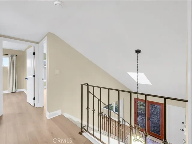 an aerial view of a house with a garden and entertaining space