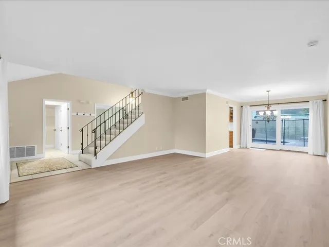 a kitchen with stainless steel appliances granite countertop a sink and a granite counter tops