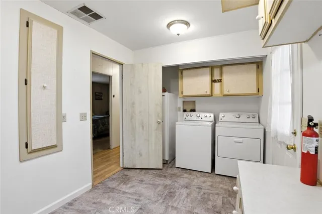 a room with furniture and wooden floor