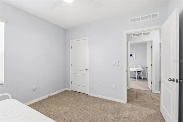 a workspace with furniture and a window