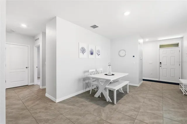 a workspace with furniture and window