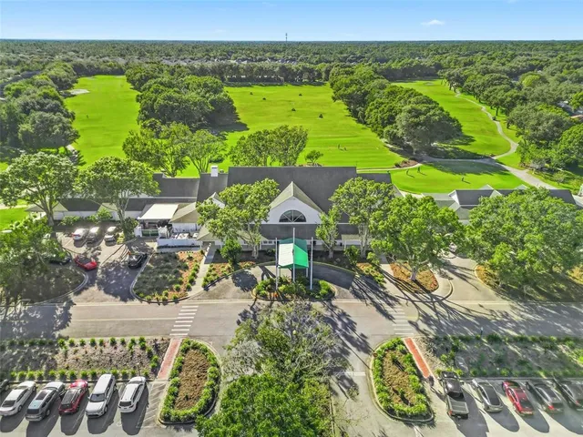 an aerial view of a house with a ocean view