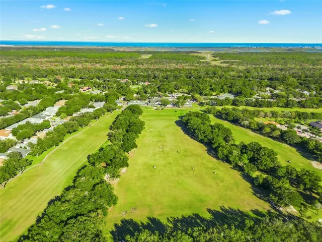 a picture of a park with a bench