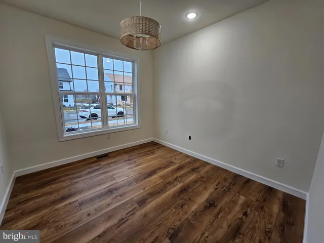 a bathroom with a sink toilet and mirror