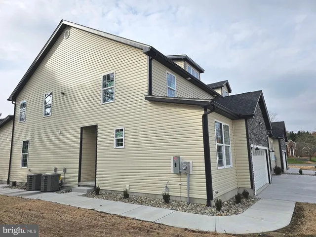 a front view of a house with entertaining space