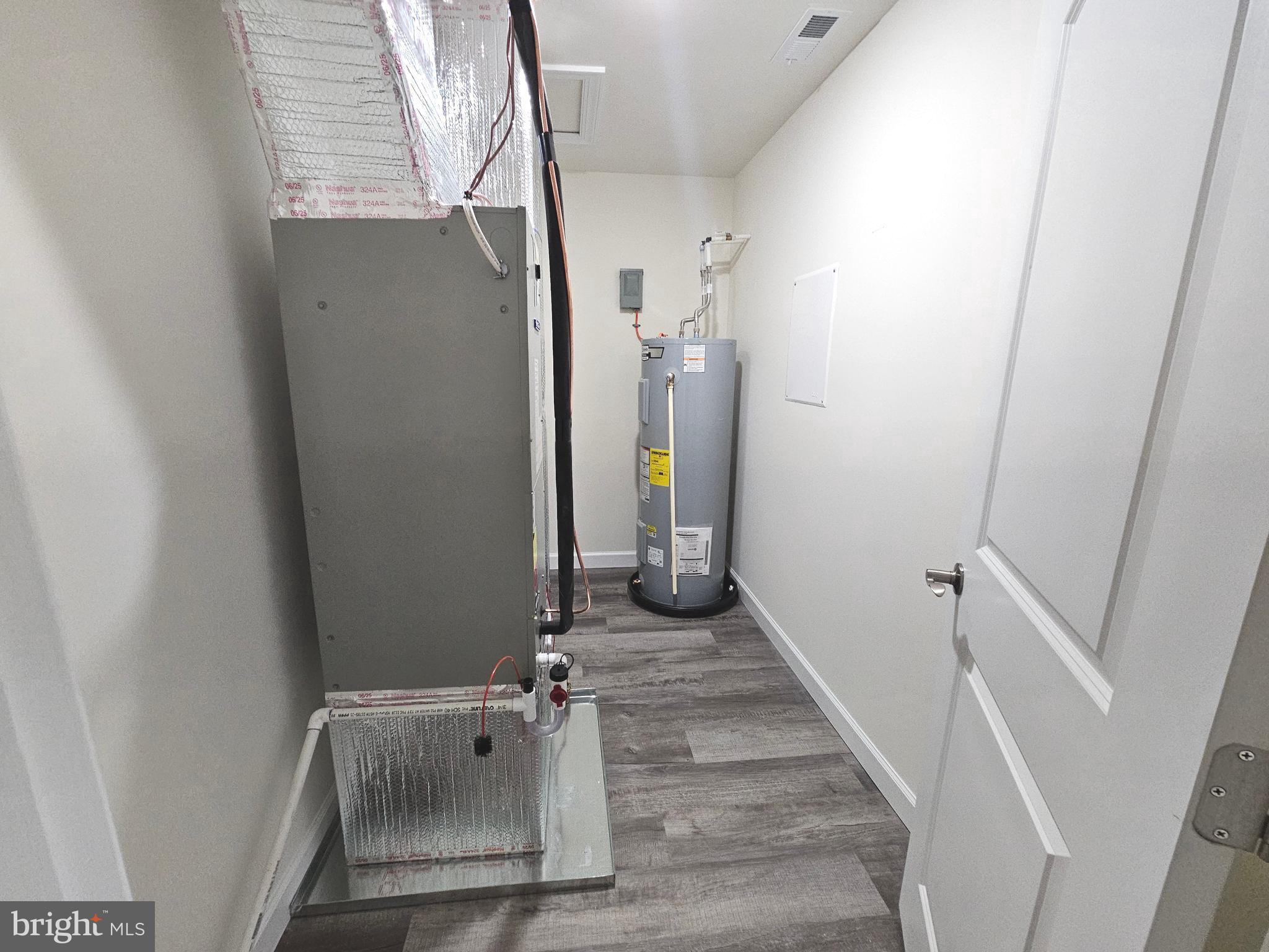 6 Valhalla Court Dover, DE 19904 - Photo 40 of 40 a view of a hallway with wooden floor and staircase
