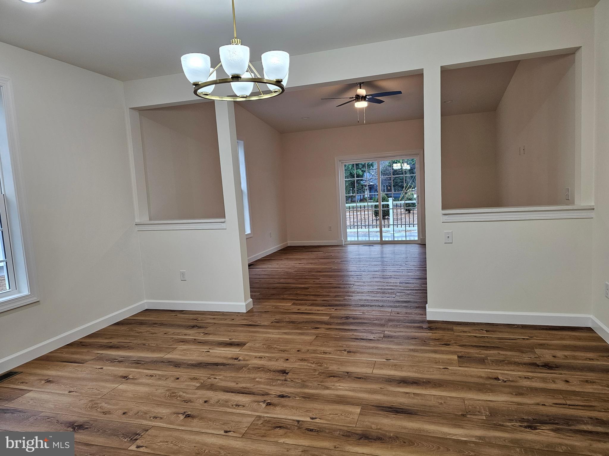6 Valhalla Court Dover, DE 19904 - Photo 9 of 40 a view of a room with wooden floor and chandelier